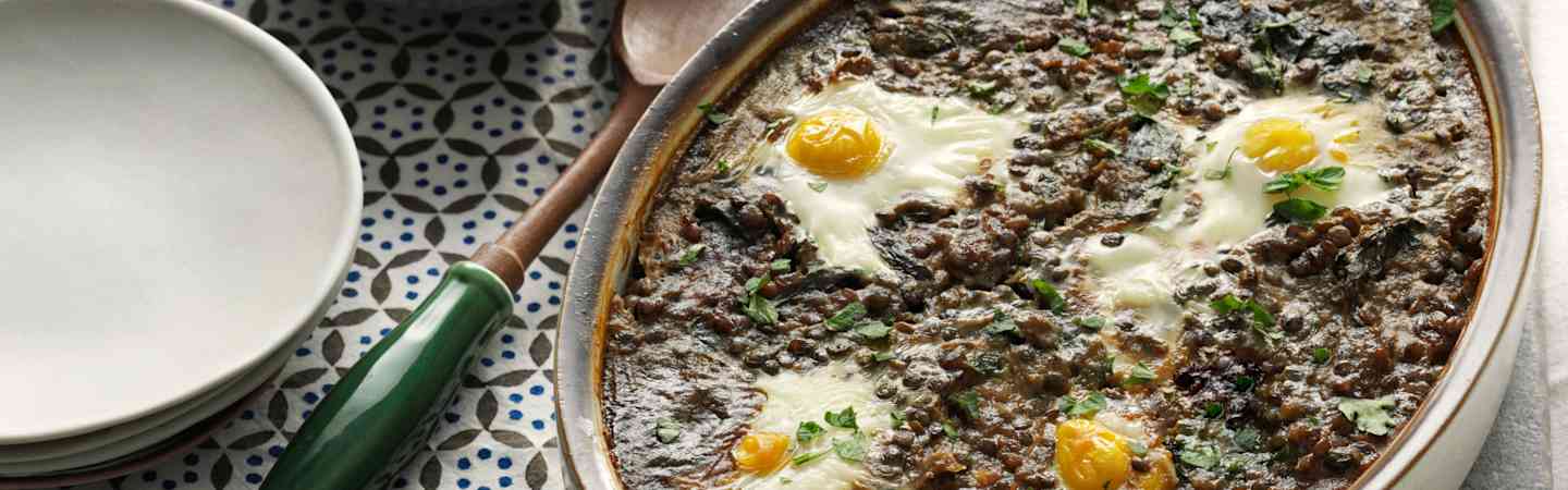 Baked Eggs in Tomato and Lentils with Goat’s Cheese Sauce-image