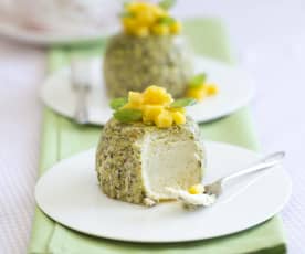 Steamed pistachio cheesecakes with mango
