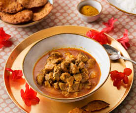Curry madrás de cordero con papadams (India)