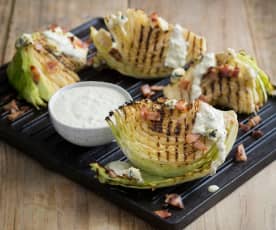 Grilled cabbage with blue cheese dressing and bacon