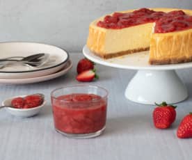 New York-style cheesecake with strawberry sauce
