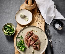 Rare beef steak with herb garlic butter