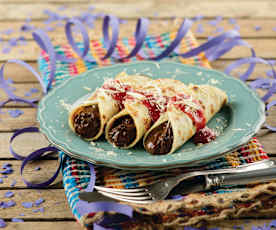 Canelones de chocolate com molho de morango