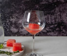Gin cocktail with watermelon ice cubes