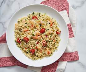 Prawns in chilli butter with risoni and herb salad