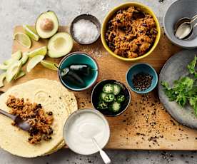 Tex-Mex tortillas with shredded pork and black beans