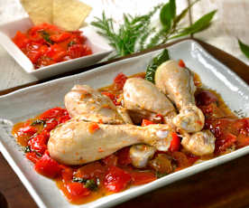 Poulet auf roten Peperoni