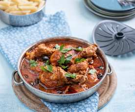 Chicken drumsticks in spicy puttanesca sauce