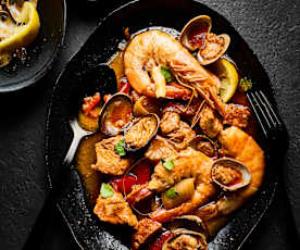 Estufado de porco e marisco