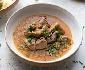 Aguja de cerdo encebollada al jerez