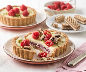 Mini Tarteletts mit weißer Schokolade und Himbeeren