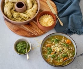 Chunky vegetable barley soup with seed pesto bread twist