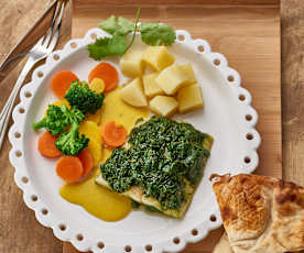 Indian-style fish with yoghurt sauce, potatoes and vegetables