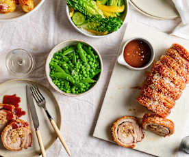 Roast porchetta with fig macadamia stuffing