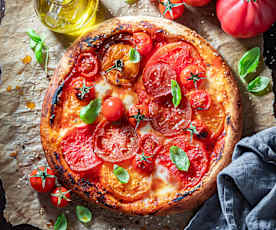 Pizza integral con tomate y mozzarella