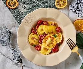Ravioli di agrumi e menta con pomodorini confit