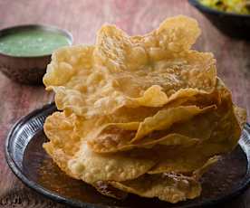 Pappadums with mint and coriander chutney