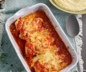 Überbackene Hühnerbrust in Tomatensauce mit Erdäpfelpüree