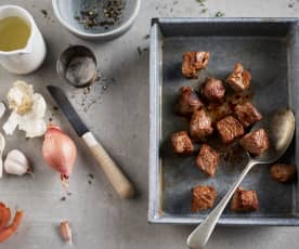 Dorer 250 g de bœuf en cubes (bien cuit)