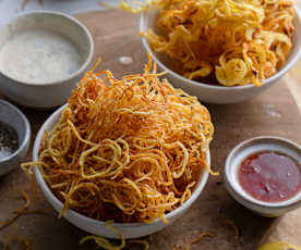 Riccioli di patate fritte con salsa all’aglio