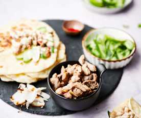 Pork Tenderloin with Spicy Coconut Sauce, Garlic Naan and Cucumber Salad