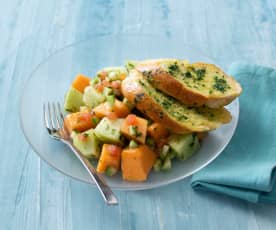 Melon salad with herb and garlic bread