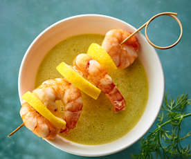 Cucumber soup with prawn skewers