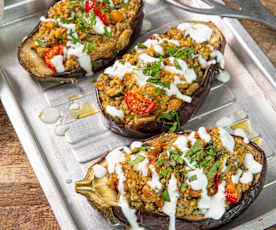 Melanzane ripiene di cous cous alle erbe con ceci e pomodorini