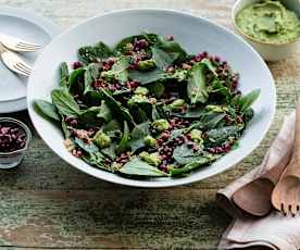Spinach salad with crunchy quinoa and green goddess dressing