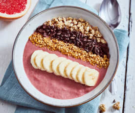 Cherry smoothie bowl with cacao nibs and muesli