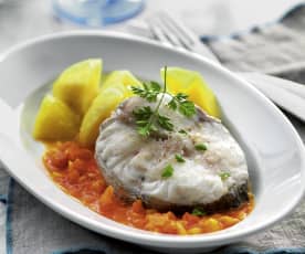 Fish and potatoes with tomato sauce