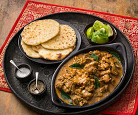 Kuruma iraichchi with coconut roti