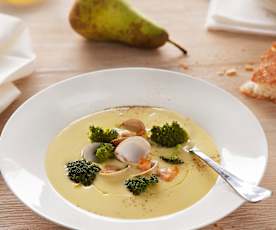 Brócoli al vapor sobre crema de puerros al aroma de berberechos