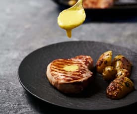 Côte de porc sous vide, sauce à l'ananas et pommes de terre rôties