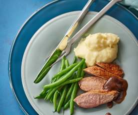 Duck breasts with orange ginger sauce, mashed potatoes and green beans 