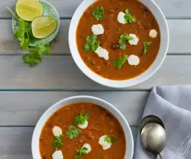 Black bean tomato soup with coriander lime cream