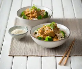 Orange sesame chicken with broccoli and noodles