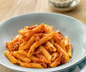 Pasta in tomato sauce with ham and chorizo
