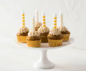 Mini caramelly cupcakes with coconut cream cheese topping