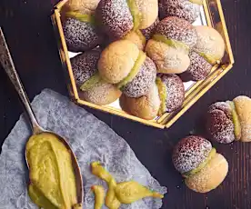 Baci di frolla montata con ganache al pistacchio
