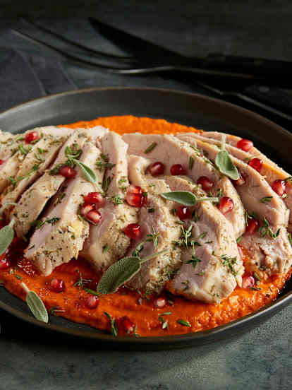 Sous-vide Herbed Turkey with Roasted Red Pepper Sauce