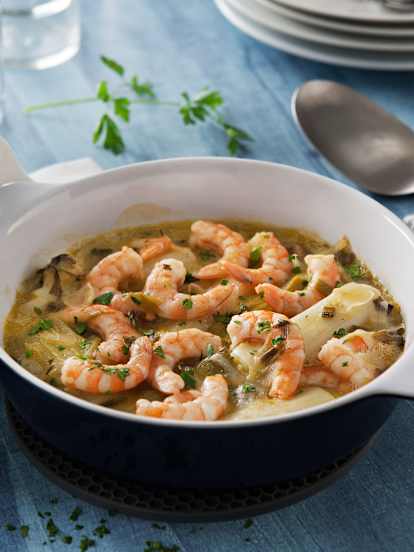 Puerros con langostinos en salsa de verde de cebolleta