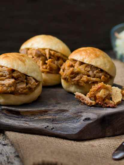 Slow-cooked pulled pork with steamed buns
