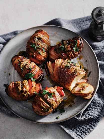 Hasselback potatoes with bacon and herb butter