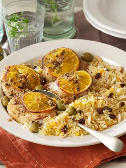 Frango assado com laranja e arroz árabe