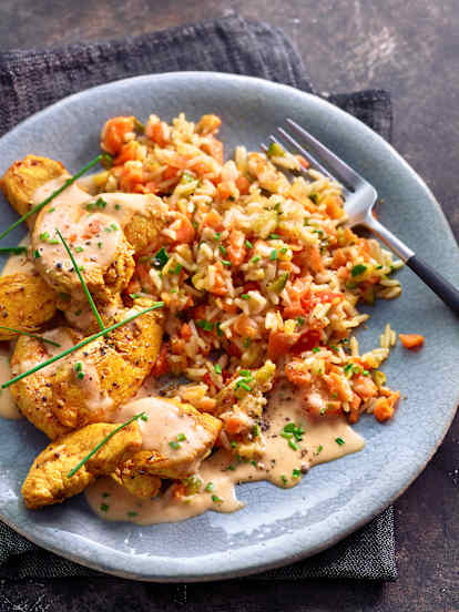 Poulet mit Zucchetti-Karotten-Reis