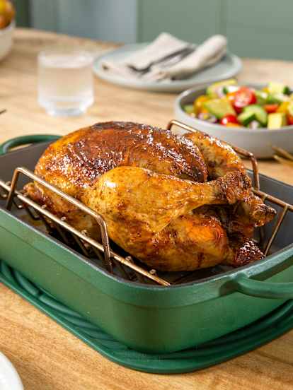 Peruvian roast chicken with green sauce and avocado salad