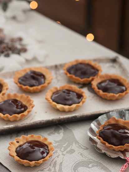 Tartaletas de chocolate con dulce de leche y nuez