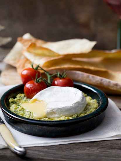 Melted Brie with basil and lemon pesto