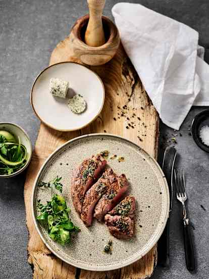 Rare beef steak with herb garlic butter